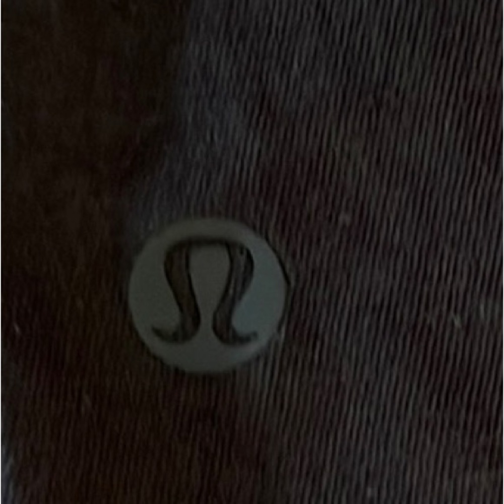 lululemon short sleeve Pima cotton black top. It has a flattering knot on front!